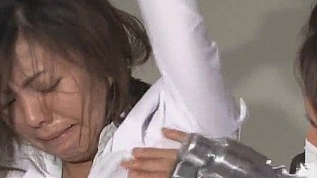 Cute Asian babe in electro play bondage scene