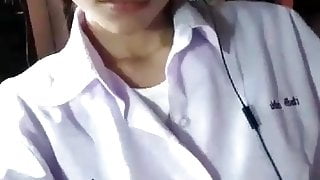 Cute young Thai girl shows her big boobs and pretty pussy